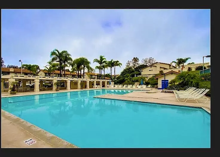 THE COMMUNITY POOL, CHANGING ROOMS AND JACUZZI.