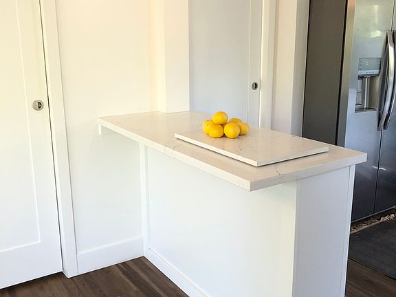 Island and doors to Office and Bedroom