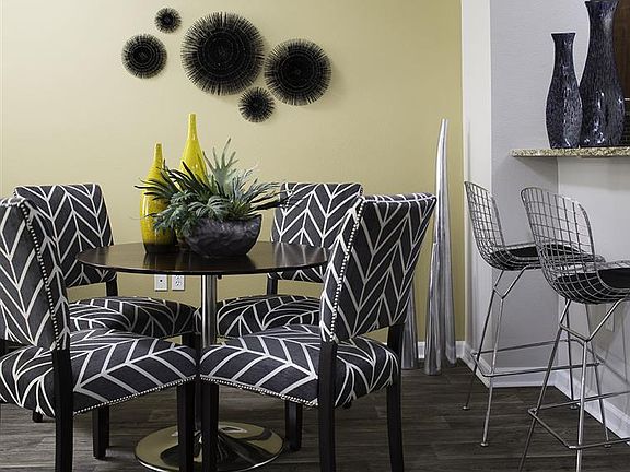 Separate dining spaces with breakfast bars
