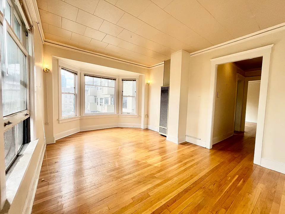 Beautiful End unit with original hardwood floors with lot of windows for natural light