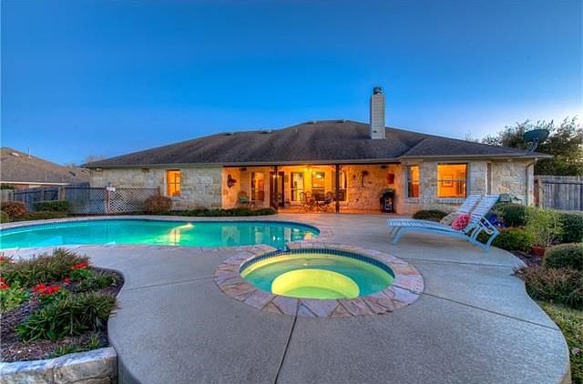 Your backyard oasis comes with a sparkling pool, spa and deck space for chairs and tables.
