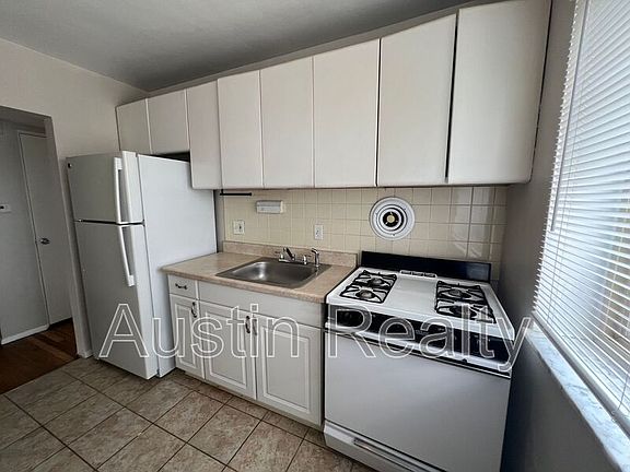 2nd image of 9011 Olive Blvd APT 2C