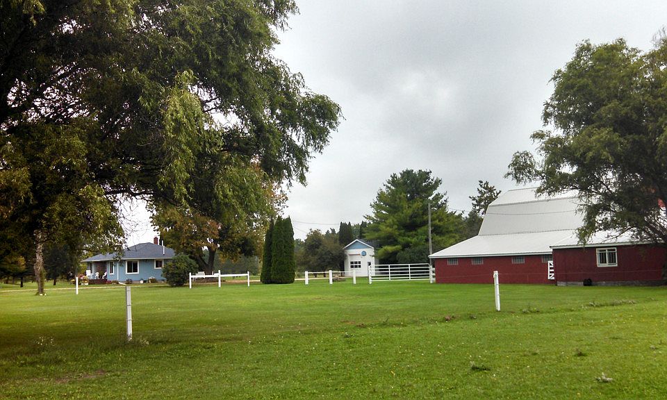 28 acres on the Salt River.  This property will take your breath away.The Salt River wanders through the 28 acres in two locations. The property is set up for horses,with 5 horse stalls , 3 pastures and a barn with a hay loft .Many Many updates----- see throughout this write-up.The home was 3 bedrooms,but a wall was removed.The wall can be put back in. The basement is a full dry basement . The home has 2 bathrooms..Anyone needing an outbuilding or polebarn,this is the place for you---