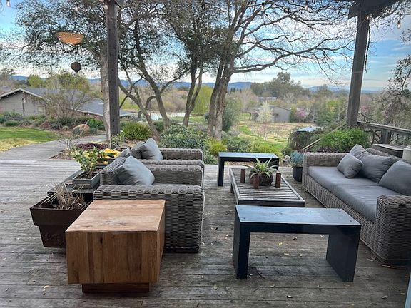 Back slider view. Backyard deck view of back pond.