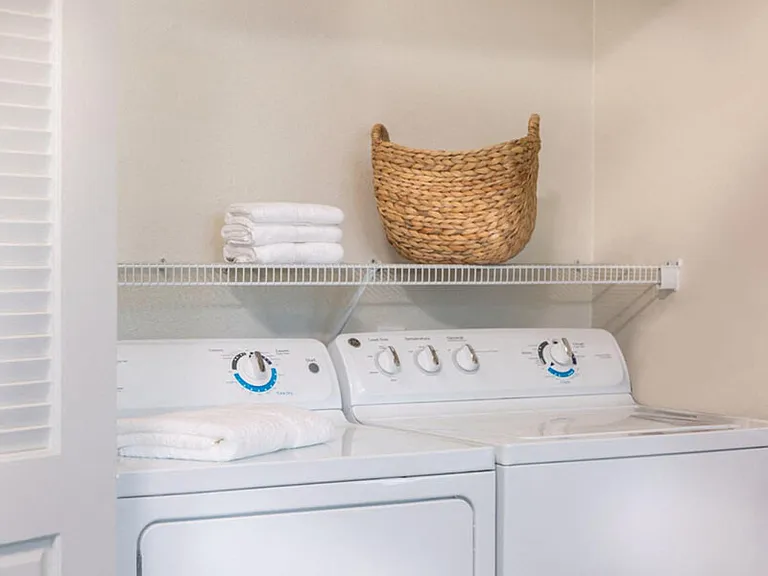 Full-size washer and dryer included in your unit!