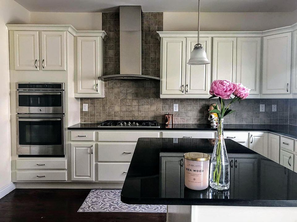 Lots of cabinet space with granite countertop 