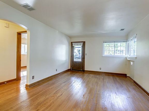 View towards front door, bedrooms to left