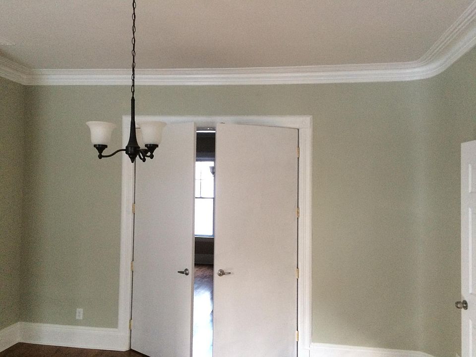 Inside bedroom 1 with view to open LR/Kitchen. Private entry