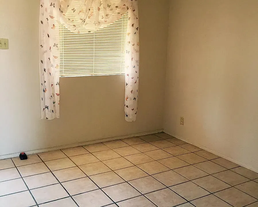 Building Photo - 4013 Nashville Ave #1