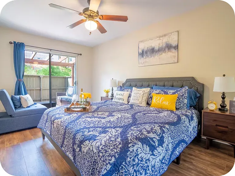 Master bedroom fully fur iced with King bed, sofa bed and mounted TV. New A/C unit not shown in picture. Ice cold.