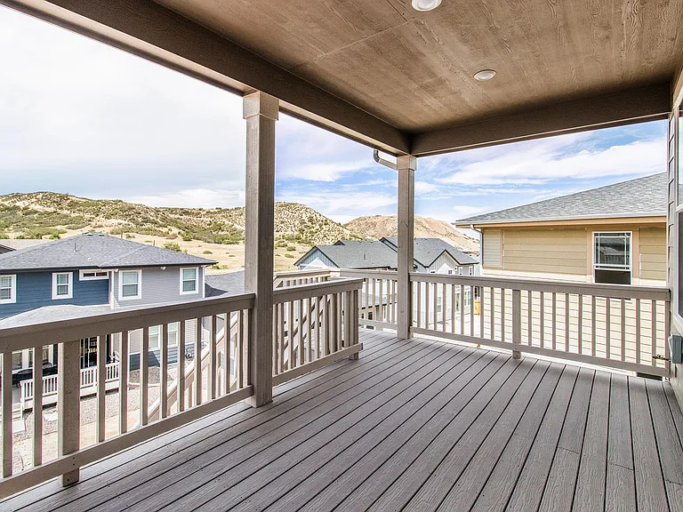 1st Floor Covered Deck with beautiful sunset view.