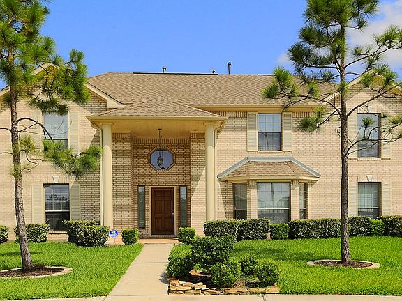 EXCELLENT CURB APPEAL WITH THIS OUTSTANDING TWO STORY HOME SITUATED ON AN OVERSIZED CUL DE SAC LOT ~