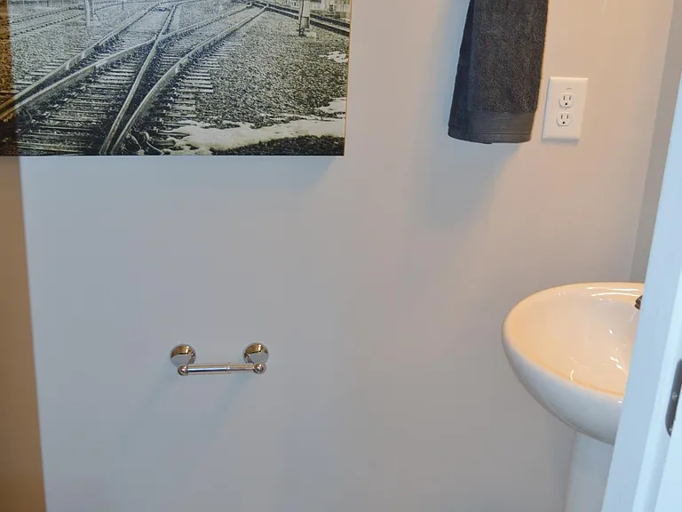 This is a second look at the beautiful second powder room right behind the kitchen.