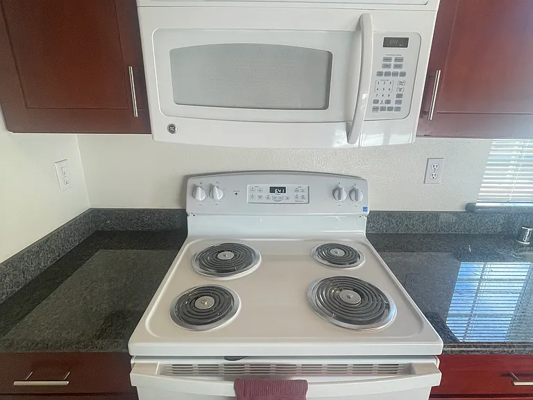 GE 4-Burner Stove with Self-Cleaning Oven and Microwave