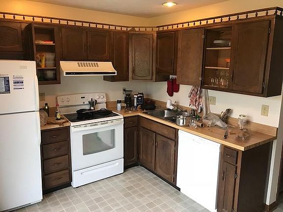 Lots of cabinets. Modern appliances.