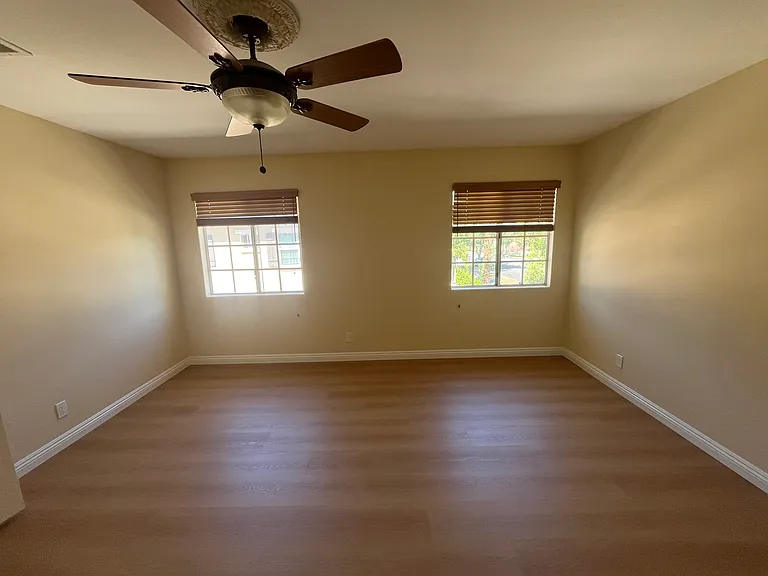 Master bedroom features ceiling fan