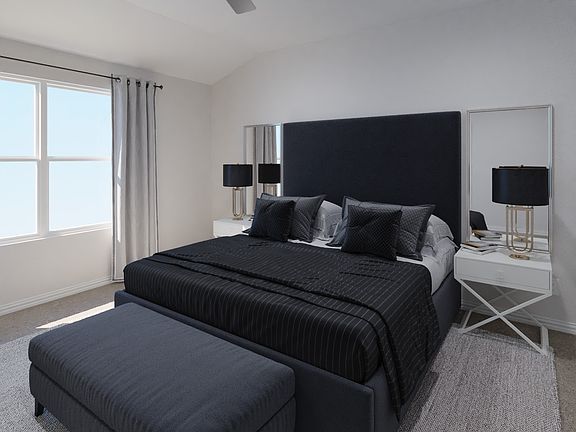 Enjoy the evening in your primary bedroom.