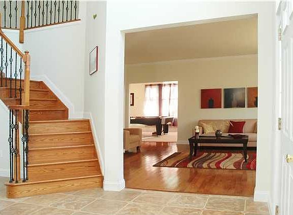 2 Story Foyer leading to Dining Room or Living Room and Conservatory