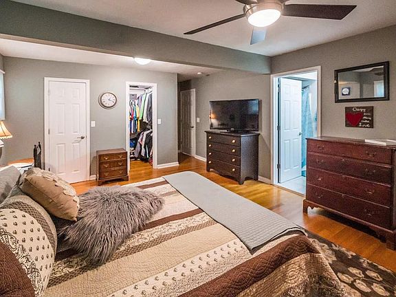 master bedroom with 2 walk-in closets