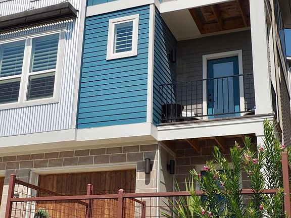 3 stories, 2 balconies, gated front yard