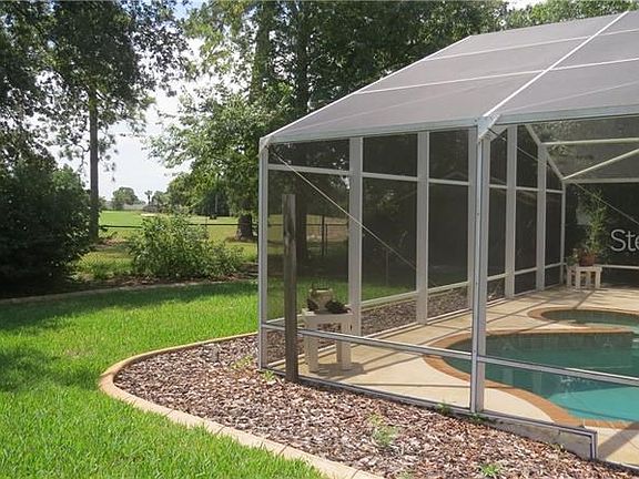 Pool with view out to golf course