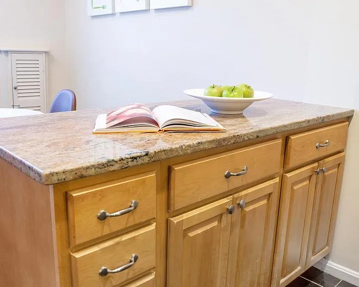 Island with extra countertop space and storage