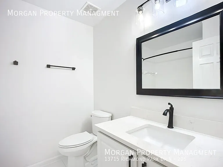 13715 Richmond Park Dr N #206 — Photo 17