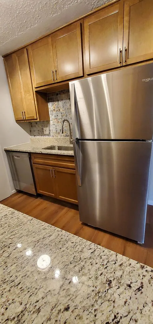 Renovated Two Bedroom Condo with Garage Space in Ladue School District — Photo 1