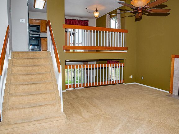Main level living room views to upstairs and downstairs.