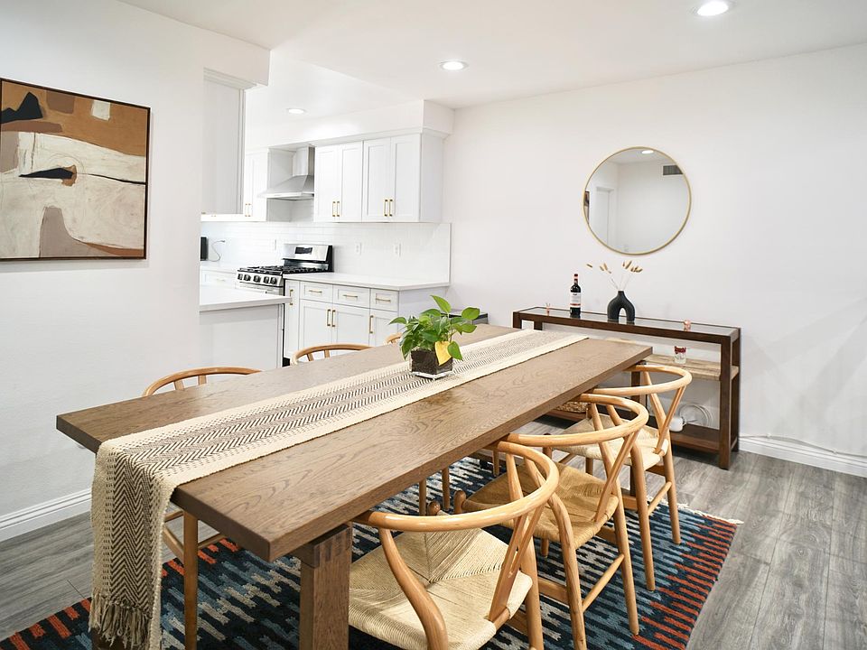 The dining room has a large table that comfortably seats 6.