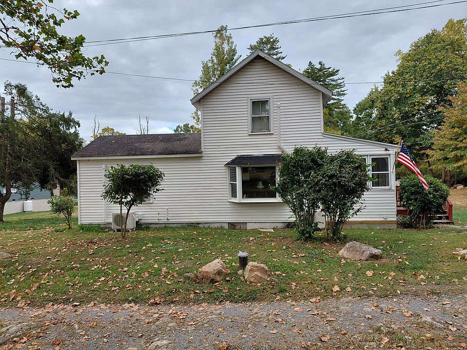 Side facing Panther Lane. Bay window looking out to Lions Barn property.
