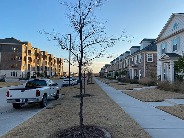 spacious walkway with additional parking for guests