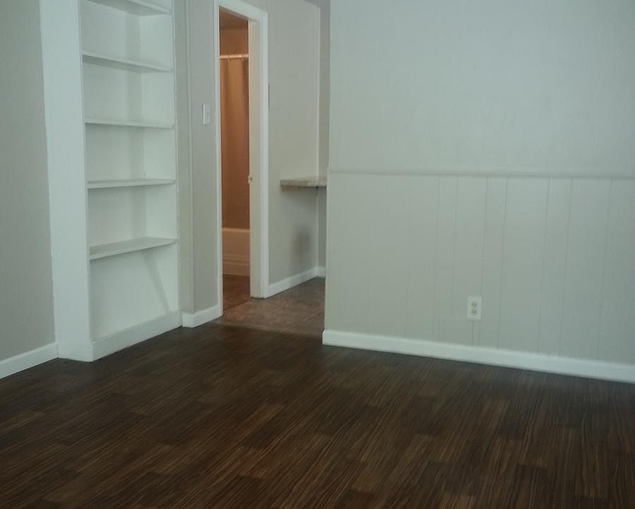 Looking from main room to bath and kitchen
