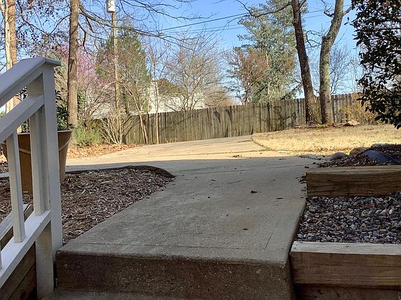 There are several steps down to the front door.