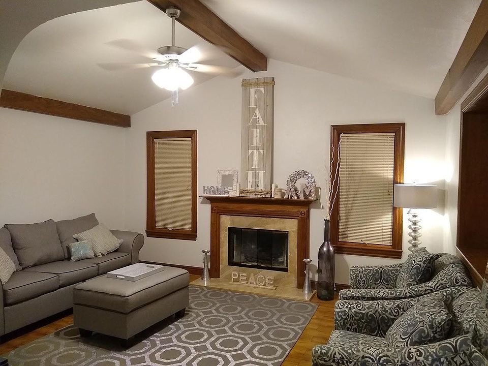 Living room with gas fireplace.