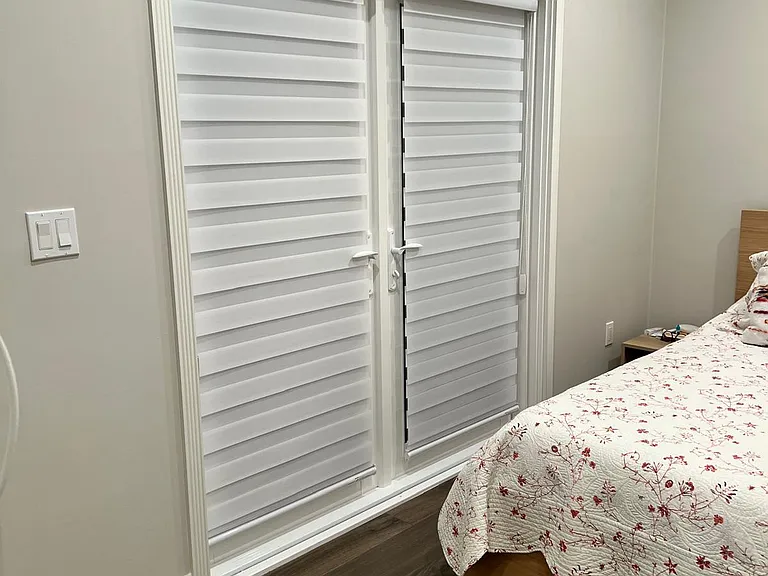 bedroom french doors leading to front patio