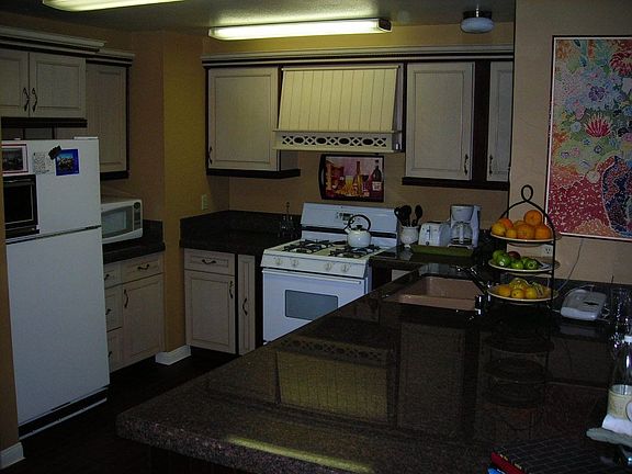 High end cabinetry with crown moulding and granite.  All shelves pull out!