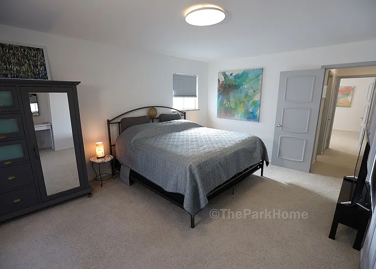 The reverse view of the primary bedroom toward the doorway.