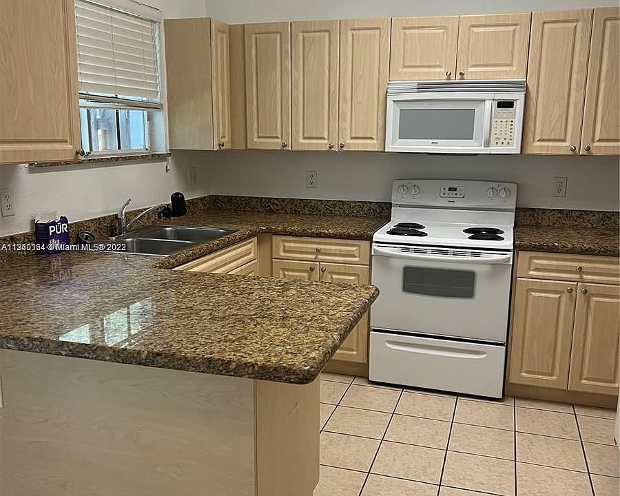 1st image of 376 NE 26th Ter Unit 102