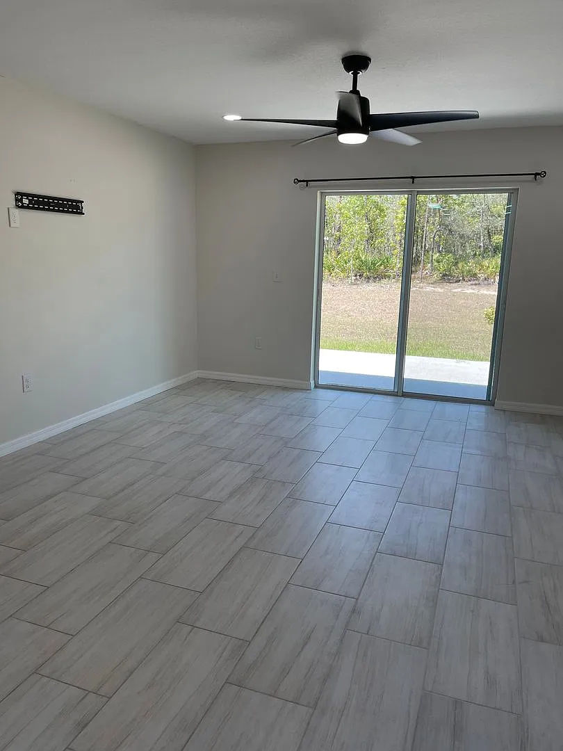 Beautiful four bedroom, two bath, two car garage and a half acre lot — Photo 3