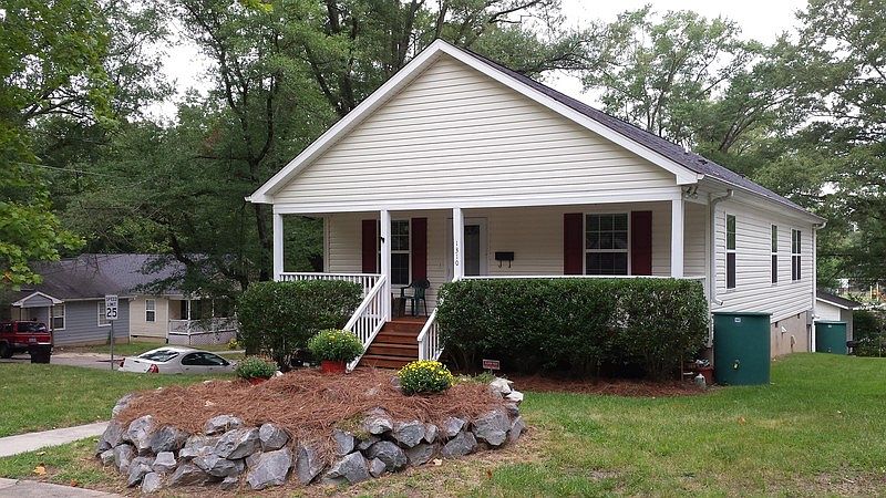 Front of House
						:
						A beautiful corner lot with a gorgeous yard and big front porch!