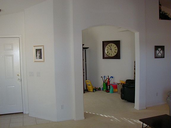 Front door and open den (now has cherry wood laminate)