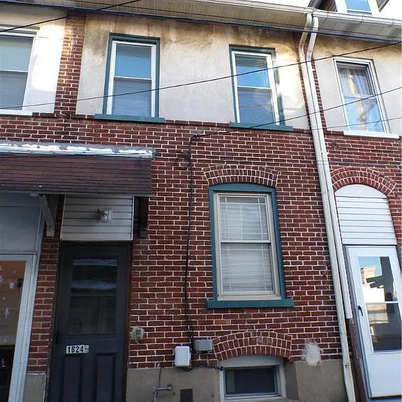 1624 1/2 Utica St — Photo 1