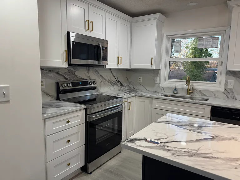 stainless steel microwave and electric stainless steel stove and new kitchen window