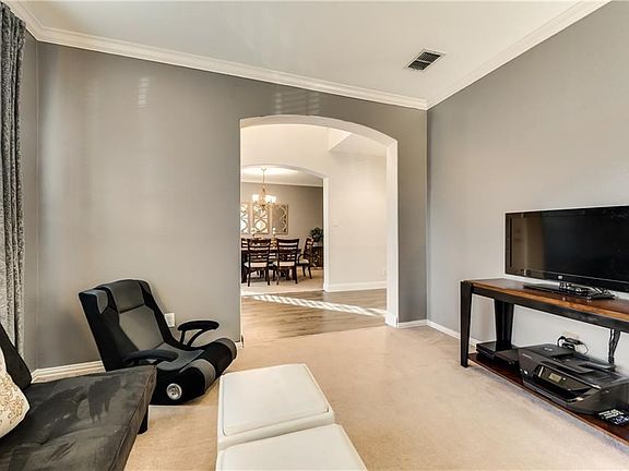 Formal living area or office.