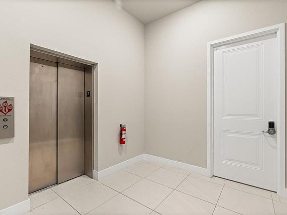 2nd image of 7770 SANDY RIDGE DRIVE 218 BLDG 28 With Elevator