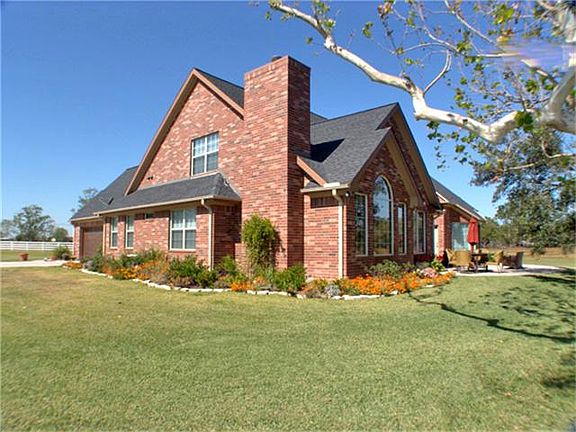  Beautiful custom home on large tract of land.