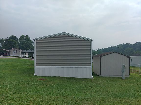 End of house away from road 