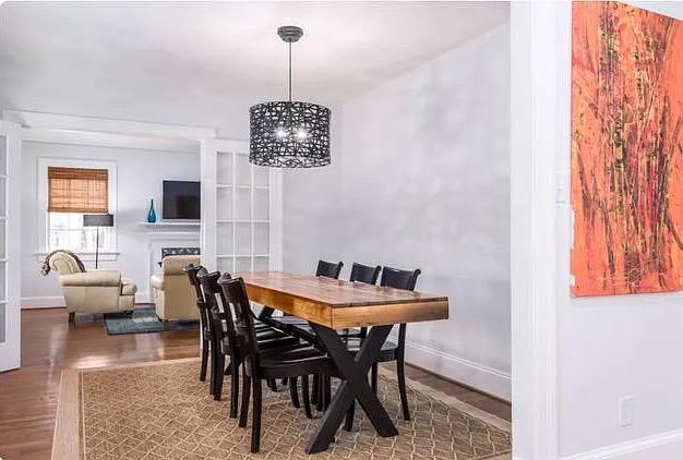Dining room with rustic farmhouse table.