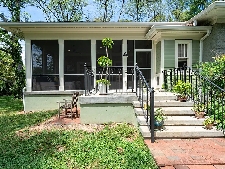 Landing outside screened-in porch
